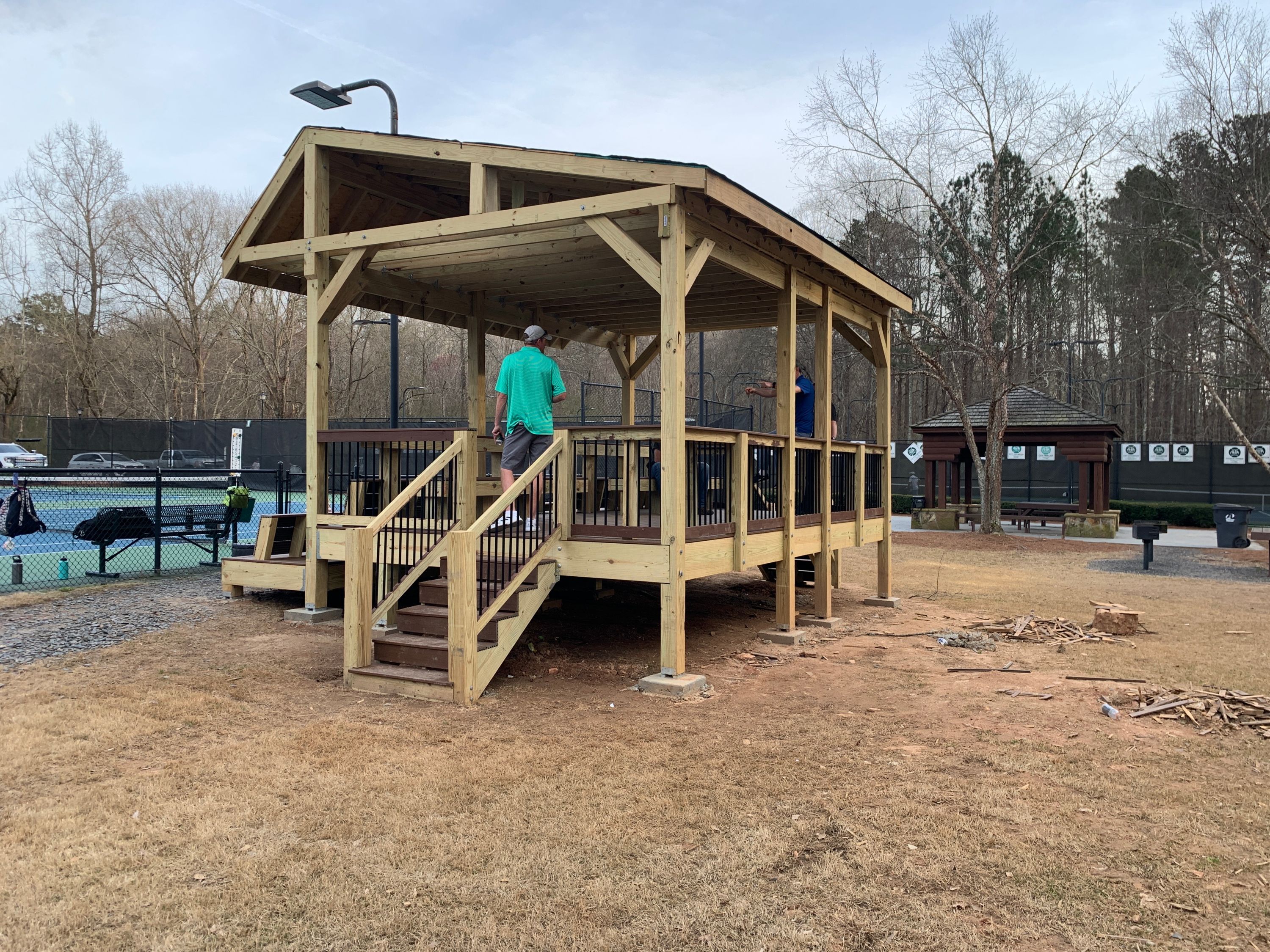 Covered pavilion built by Source One at a community tennis facility