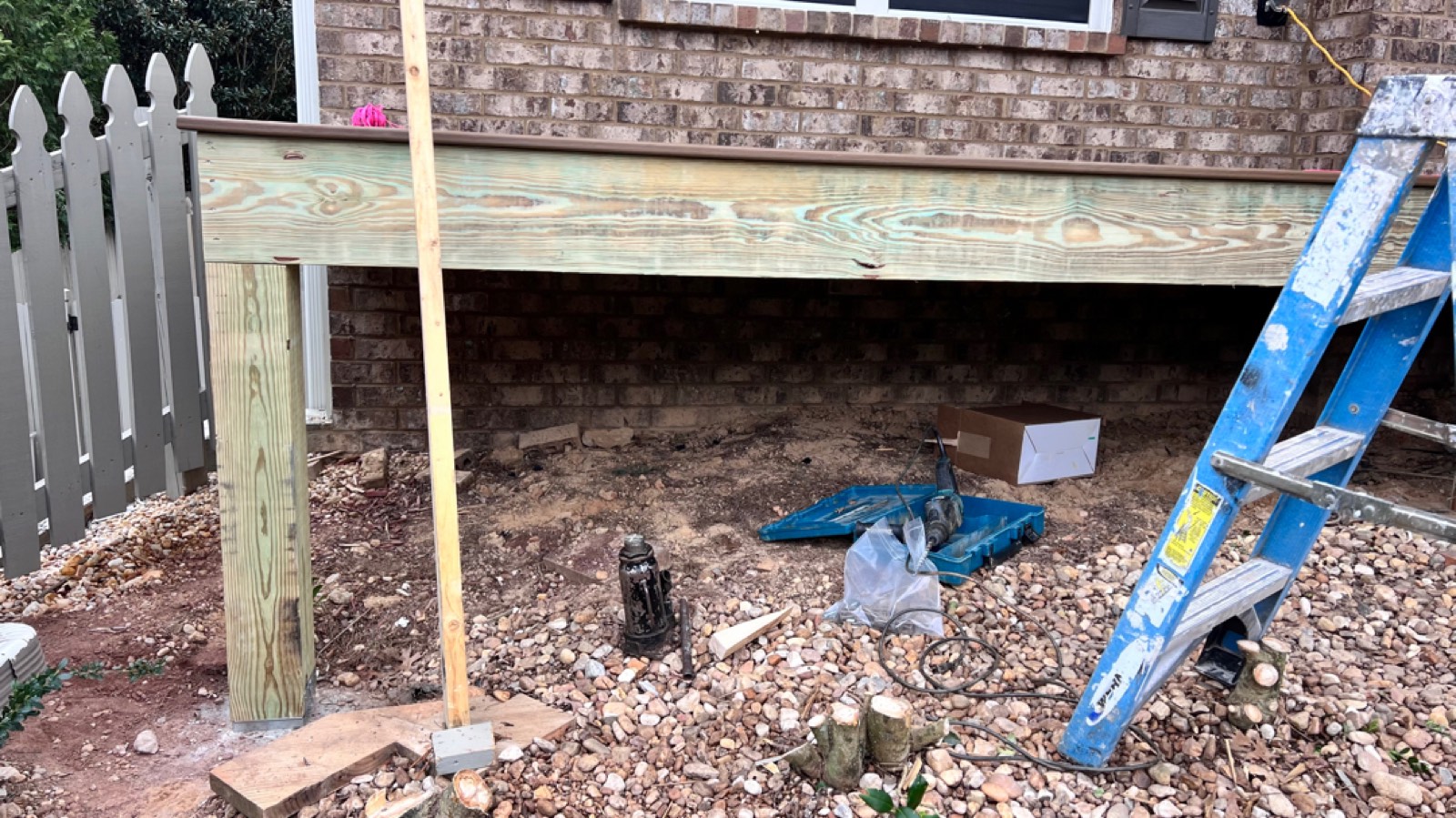 Roof jacked up on temporary posts while we set new support posts and footers