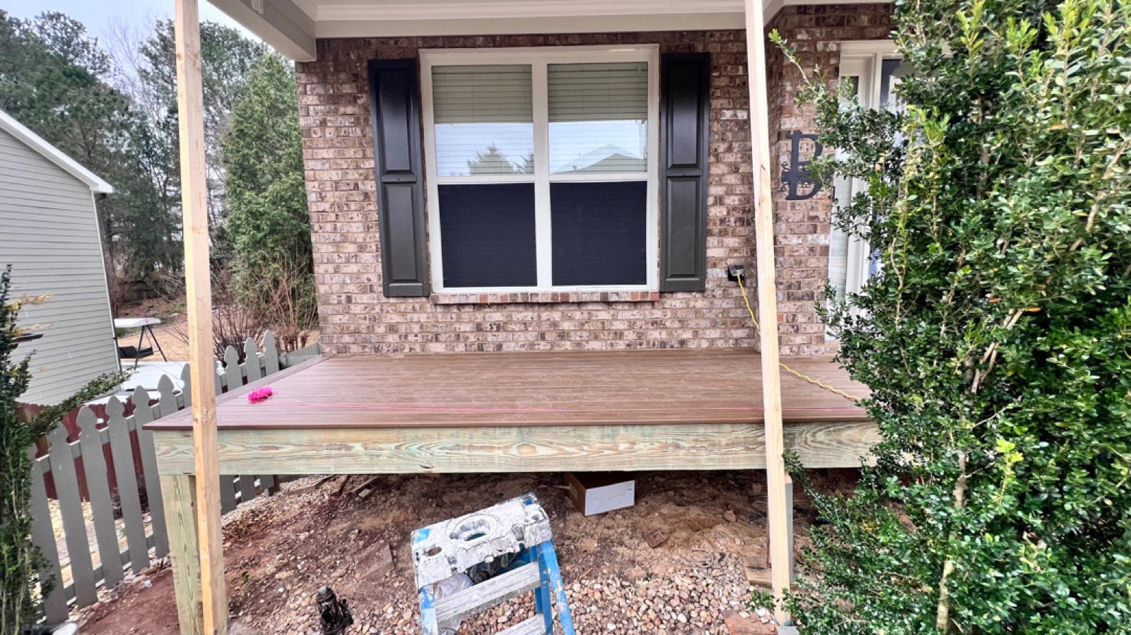 New deck framed with 2x10 pressure-treated joists and floored in Trex Havana Gold