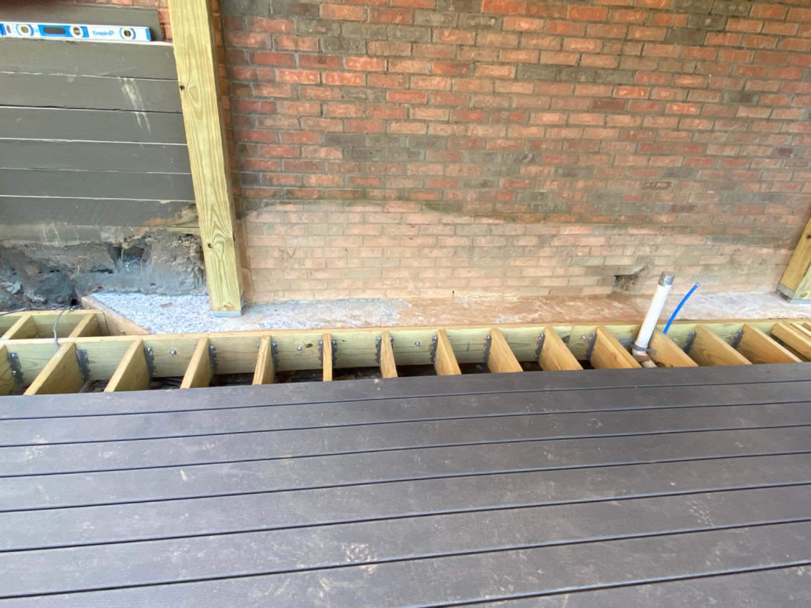 Trex decking installed over an upsized support system, fastened with hidden Trex clips